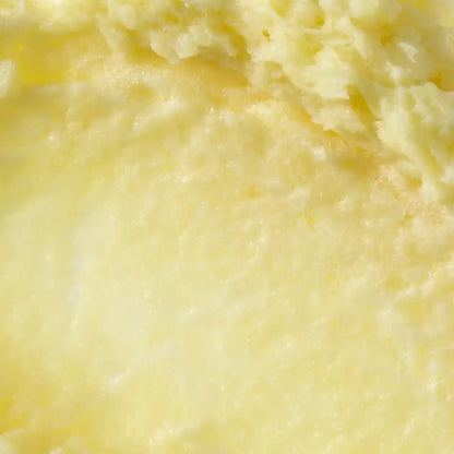 Macro detail of the dense, fluffy soufflé-to-foam texture of Axis-Y Kojic Yuzu Pack Cleanser.