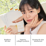 A woman holding Dr. Althea Vita Glow Masks, highlighting benefits like skin brightening and collagen synthesis support.