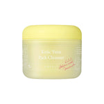 Isolated yellow jar of Axis-Y Kojic Yuzu Pack Cleanser with lid, set against a white background.