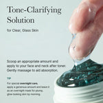 Close-up of turquoise gel texture being scooped for glass skin, emphasizing its bouncy, clear consistency.