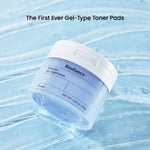 Jar of Biodance Cera-nol Gel Toner Pads resting on a refreshing blue gel-textured background.