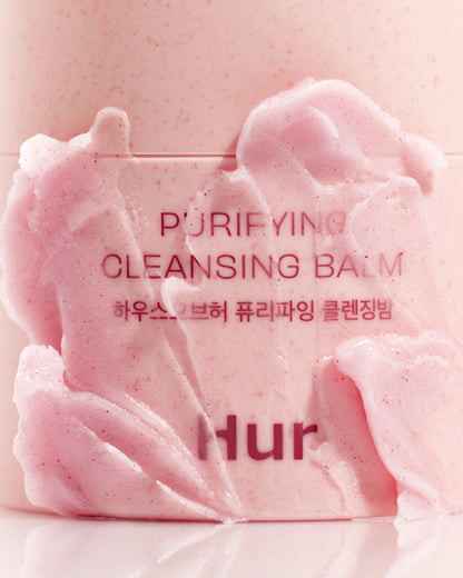 Macro shot of the pink sorbet texture of House of Hur Cleansing Balm showing its soft, spreadable consistency.