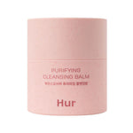 Minimalist front view of the House of Hur Purifying Cleansing Balm 50ml pink container on a white background.