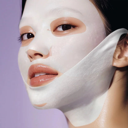 Close-up of a model wearing the Numbuzin No.9 lifting band for a defined facial contour.