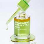 Purito Azelaic Acid 10 Kojic Tea Tree Serum bottle with dropper showing product texture.