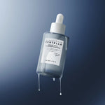 Milky serum texture of the Skin1004 Hyalu-Teca Ampoule on skin.