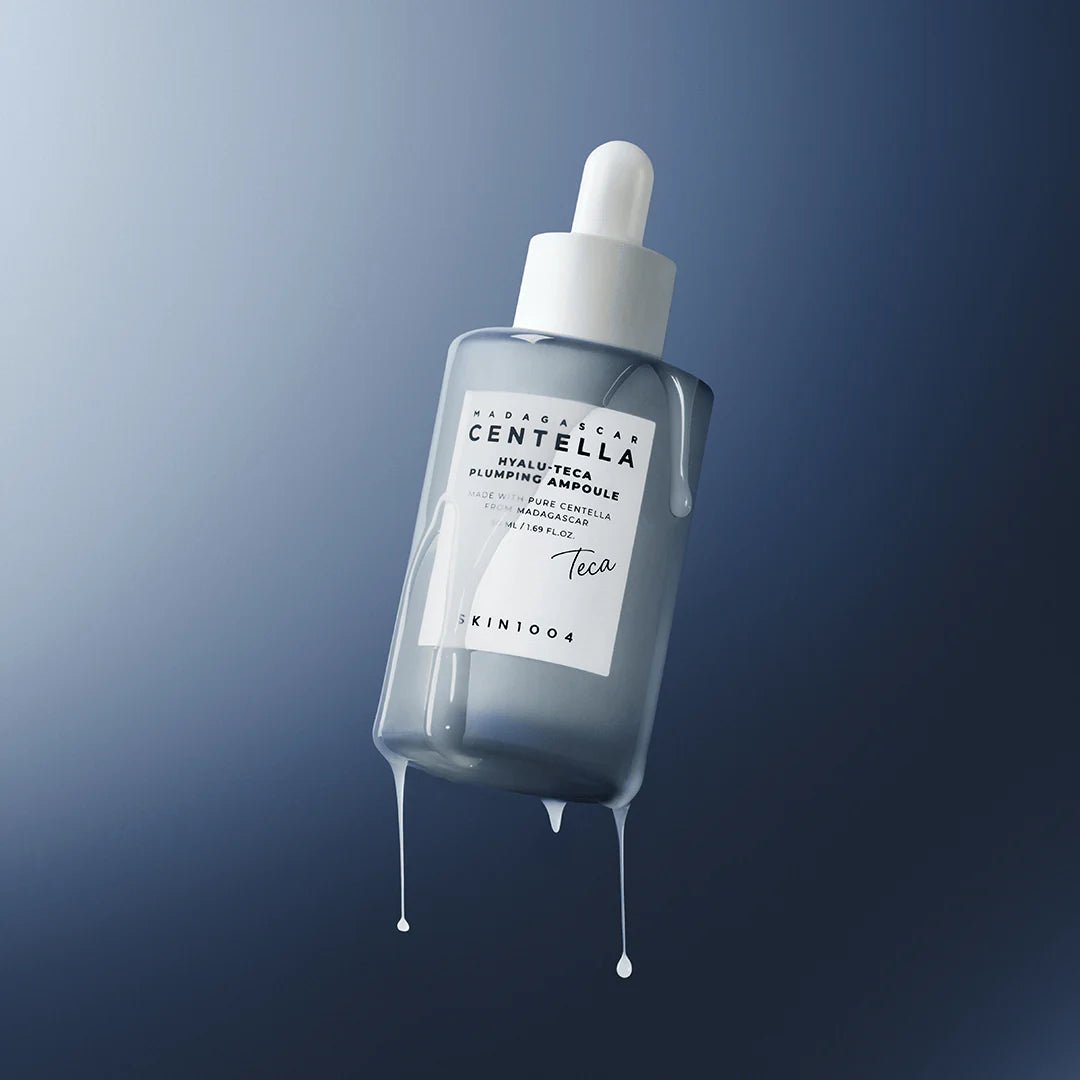 Milky serum texture of the Skin1004 Hyalu-Teca Ampoule on skin.