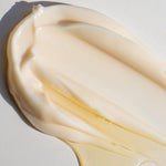 A thick, silky swatch of mixsoon Bean Cream showing its rich and hydrating consistency.