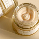 Close-up of open mixsoon Bean Cream jar showing the smooth, creamy texture of the moisturizer.